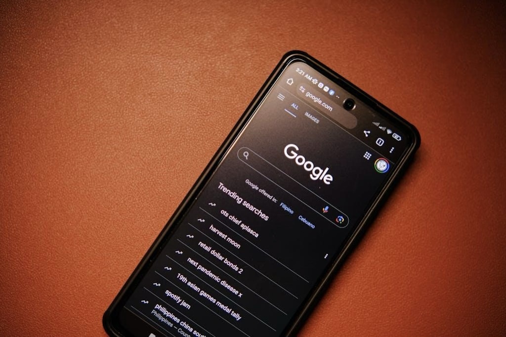 Google search page with a list of keywords on a smartphone screen